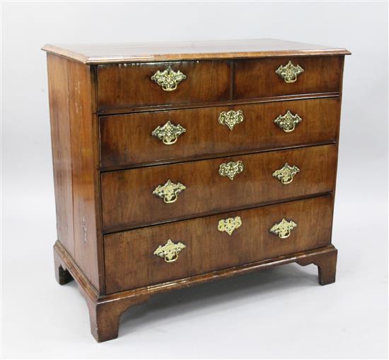 A George II walnut chest, W.3ft D.1ft 8in. H.2ft 11in.